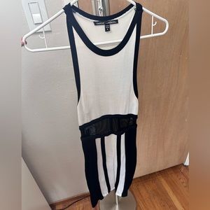 Bebe black and white thick material dress in size Medium